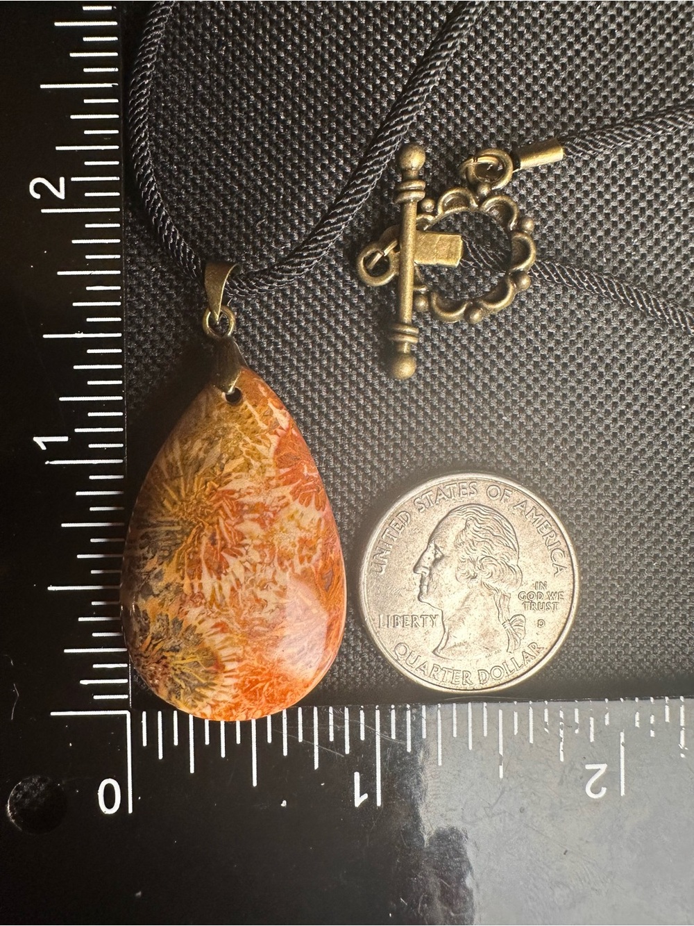 Orange and Black Coral Fossil Teardrop Pendant Necklace on Black Rope - Picture 15 of 16
